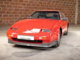 an image of a red car parked in a garage