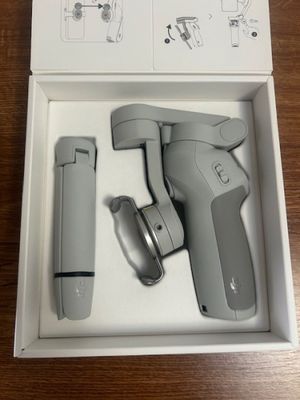 a box with a hair dryer in it on a table