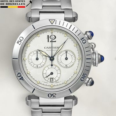 a close up of a watch on a white background