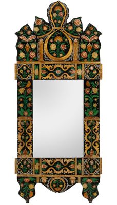 an image of a mirror with a floral design on it