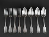 six spoons and six forks are lined up on a black surface