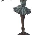 statue of a ballerina in a tutu on a pedestal