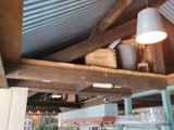 a light that is hanging from the ceiling of a restaurant