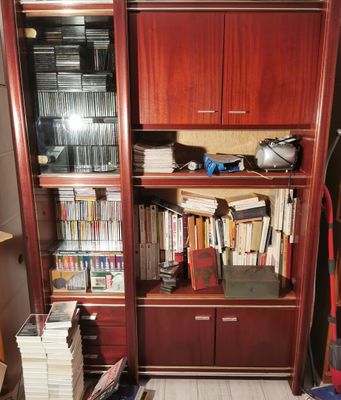 a book shelf with a lot of books on it