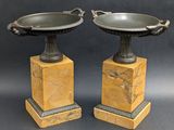 pair of marble pedestals with metal handles and handles
