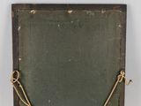 an old wooden box with a rope around it on a white surface