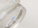 a close up of a glass jar with a label on it