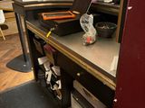 a desk with a printer on it in a room