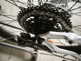 a close up of a bicycle with a chain attached to it
