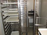 an image of a commercial kitchen with a rack of food