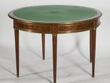 a round table with a green glass top
