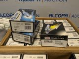 several boxes of various types of electronics are stacked on top of each other