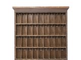 an old wooden book shelf with many compartments on it