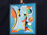 a picture of a painting on a easel with a black background