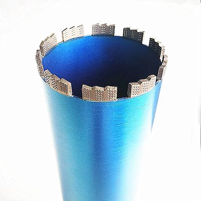 a blue vase with a hole in it on a table