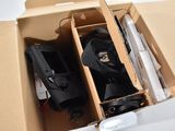 a cardboard box with a pair of shoes in it