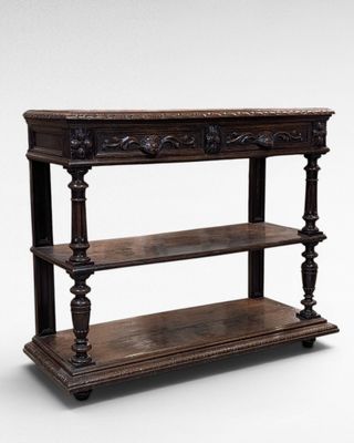 an old wooden shelf with three shelves on top of it