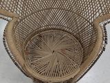 a wicker basket that is sitting on the floor