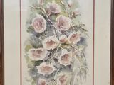 framed watercolor painting of a bouquet of pink flowers in a wooden frame