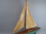 a model of a sailboat that is on display