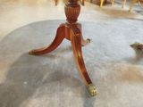 a table that has a vase on top of it