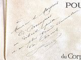 a close up of a piece of paper with writing on it