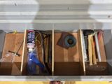 a picture of a drawer that has tools in it