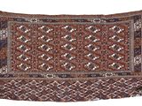 a close up of a brown and black rug on a white background