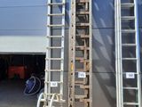 a ladder that is leaning up against a building