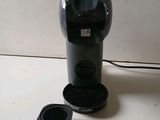 a coffee maker that is sitting on a table