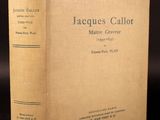 a close up of a book on a table with a black background