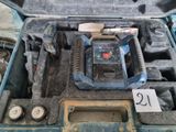 a tool in the case that is sitting on the floor