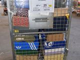a metal cart with boxes in it inside of a warehouse