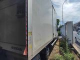 a white truck that is parked on the side of the road