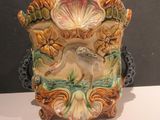 a vase that is sitting on a table in a room
