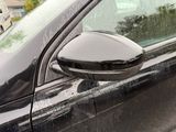 a close up of a car ' s side mirror on the side of the car