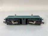 an image of a green train car sitting on top of a white surface