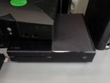 a black computer sitting on top of a table
