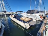 many boats docked in the water at the dock
