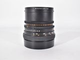 a close up of a camera lens sitting on top of a table