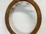 an image of a picture of a ring on a table next to a wall