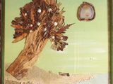 a picture of a picture of a tree on the beach