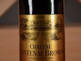 a bottle of wine that is sitting on a table