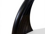an image of a black computer mouse on a white surface