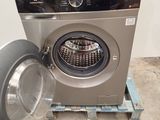 a washing machine that is sitting on a pallet
