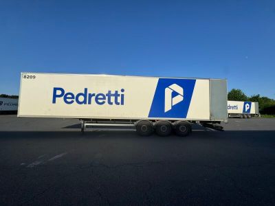 a semi truck that is parked in a parking lot