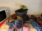 a lot of tools that are sitting on a table