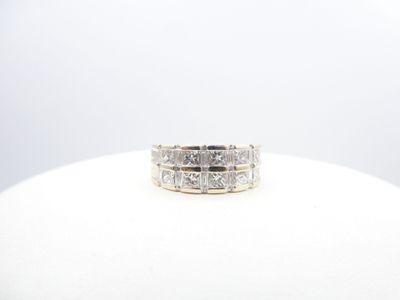an image of a diamond ring on a mannequin