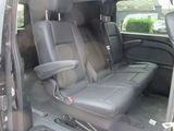 a black van with two seats in the back of it