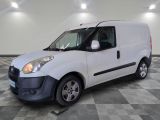 a picture of a white van on a checkered floor